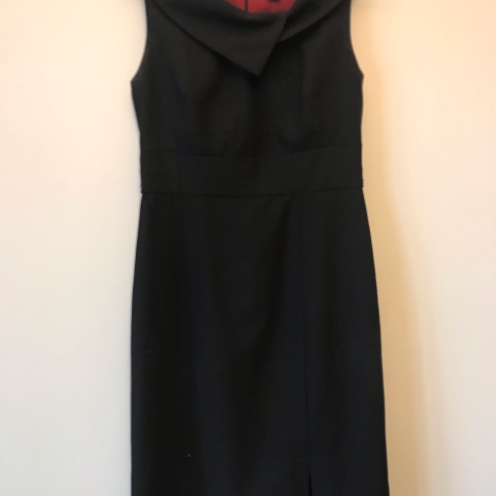 Straight cut, classy dress with Peter Pan collar.  39” in length